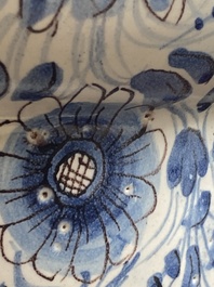 A large Italian blue, white and manganese albarello drug jar inscribed Charitas, probably Savona, dated 1767