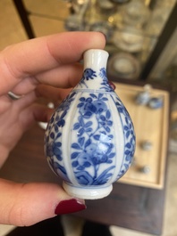Fourteen Chinese blue and white miniature vases with floral design, Kangxi
