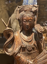 Eight Chinese wooden sculptures of female deities, 19th C.