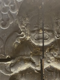 A Tibetan gilt copper 'Mahakala' plaque, 19th C.
