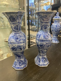 A Chinese blue and white garniture of five vases with floral design, Kangxi