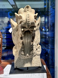 A Chinese pottery dragon head architectural tile, Song/Jin