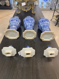 A Chinese blue and white garniture of five vases with floral design, Kangxi