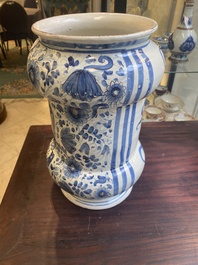 A large Italian blue, white and manganese albarello drug jar inscribed Charitas, probably Savona, dated 1767