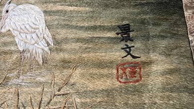 A Japanese silk embroidery with cranes and bamboo, Keibun mark, Meiji, 19th C.