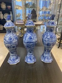 A Chinese blue and white garniture of five vases with floral design, Kangxi