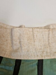 A Chinese embroidered silk 'dragon and phoenix' skirt and a wallet pouch, 18/19th C.