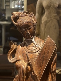Eight Chinese wooden sculptures of female deities, 19th C.