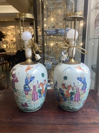 A pair of Chinese famille rose 'Eight Immortals' jars mounted as lamps, 19th C.