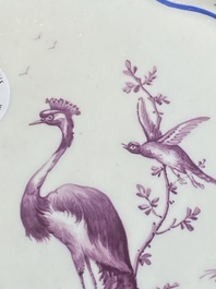 A gilt puce-enamelled 'birds' plate with a blue-enamelled border, Tournai, 18th C.