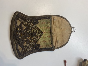 An Iranian gold-thread-embroidered silk caftan, a hat, a coin bracelet and a Koran holder, 19th C.