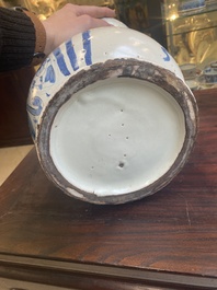 A large Italian blue, white and manganese albarello drug jar inscribed Charitas, probably Savona, dated 1767