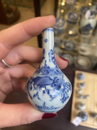 Fourteen Chinese blue and white miniature vases with floral design, Kangxi