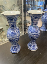 A Chinese blue and white garniture of five vases with floral design, Kangxi