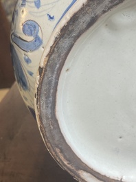 A large Italian blue, white and manganese albarello drug jar inscribed Charitas, probably Savona, dated 1767