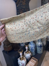 An Iranian gold-thread-embroidered silk caftan, a hat, a coin bracelet and a Koran holder, 19th C.