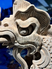 A Chinese pottery dragon head architectural tile, Song/Jin