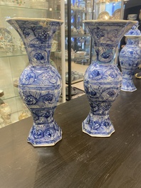 A Chinese blue and white garniture of five vases with floral design, Kangxi