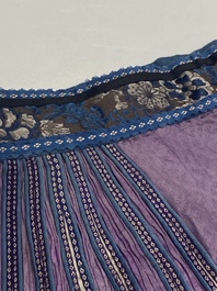Four Chinese embroidered silk skirts and three yellow 'magua' jackets, 19/20th C.