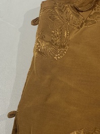 Four Chinese embroidered silk skirts and three yellow 'magua' jackets, 19/20th C.