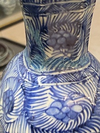 A Chinese blue and white garniture of five vases with floral design, Kangxi
