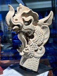 A Chinese pottery dragon head architectural tile, Song/Jin