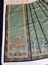 A Chinese embroidered silk 'dragon and phoenix' skirt and a wallet pouch, 18/19th C.