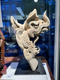 A Chinese pottery dragon head architectural tile, Song/Jin