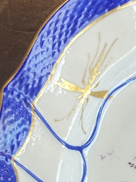 A gilt puce-enamelled 'birds' plate with a blue-enamelled border, Tournai, 18th C.