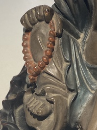 A Chinese Foochow or Fuzhou lacquer Buddha on stand, ca. 1900