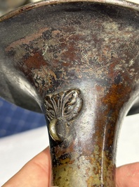 A Chinese bronze 'gu' vase and a bronze ewer and cover for the Islamic market, Ming