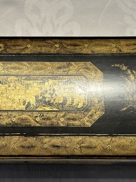 A large Chinese Canton gilt black lacquer tray, thee boxes and a fan, 19th C.
