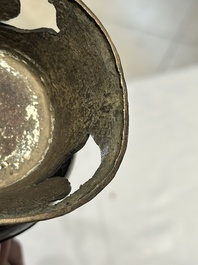 A Chinese bronze 'gu' vase and a bronze ewer and cover for the Islamic market, Ming