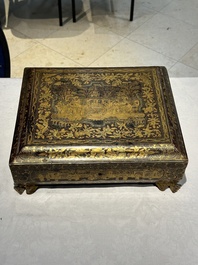 A large Chinese Canton gilt black lacquer tray, thee boxes and a fan, 19th C.