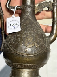A Chinese bronze 'gu' vase and a bronze ewer and cover for the Islamic market, Ming