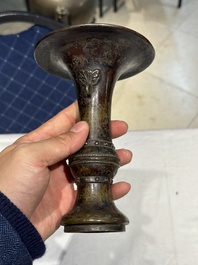 A Chinese bronze 'gu' vase and a bronze ewer and cover for the Islamic market, Ming