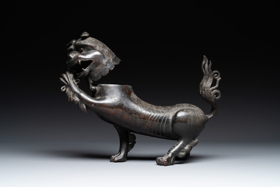 A rare and large Chinese bronze lion-form censer, Southern Song