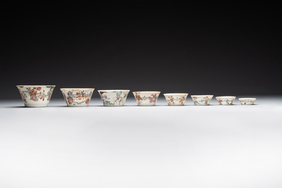A rare set of eight Chinese famille rose 'Sanxing' nesting bowls, Tongzhi mark and of the period