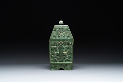A rare large and inscribed archaistic bronze wine vessel, 'fang yi 方彝', Song/Ming