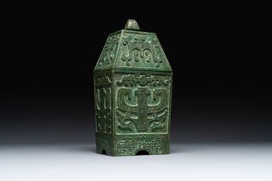 A rare large and inscribed archaistic bronze wine vessel, 'fang yi 方彝', Song/Ming