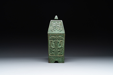 A rare large and inscribed archaistic bronze wine vessel, 'fang yi 方彝', Song/Ming
