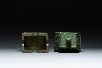 A rare large and inscribed archaistic bronze wine vessel, 'fang yi 方彝', Song/Ming