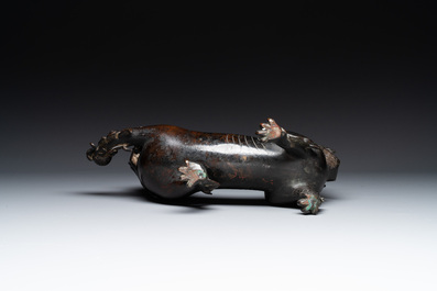A rare and large Chinese bronze lion-form censer, Southern Song