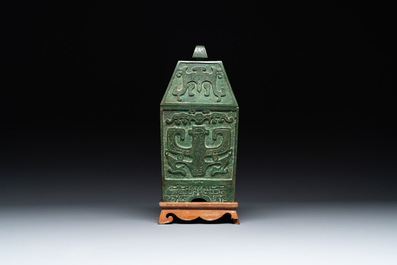 A rare large and inscribed archaistic bronze wine vessel, 'fang yi 方彝', Song/Ming