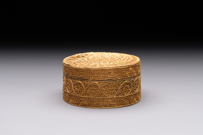 An oval Chinese imperial gold and silver filigree lidded 'dragon' box on reticulated stand and with presentation box, Qianlong mark and of the period