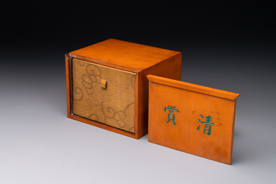 An oval Chinese imperial gold and silver filigree lidded 'dragon' box on reticulated stand and with presentation box, Qianlong mark and of the period