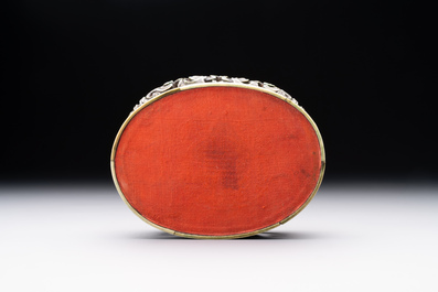 An oval Chinese imperial gold and silver filigree lidded 'dragon' box on reticulated stand and with presentation box, Qianlong mark and of the period