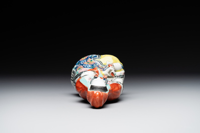 A Chinese famille rose Guanyin and a celadon-glazed dish, Chenghua mark, Qianlong/Jiaqing
