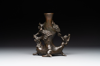 A Chinese bronze vase in the shape of a prunus, Ming