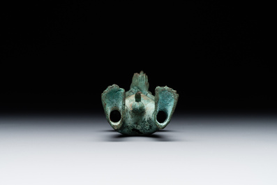 An fine Indonesian bronze sculpture of a naked man offering a sacrificial vase, Majapahit, East Java, 13/14th C.